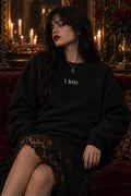 Model wearing the I Bite Vampirecore Crewneck in black