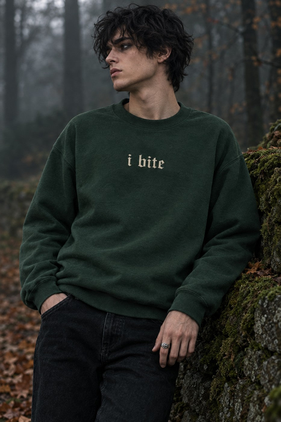 Model wearing the I Bite Vampirecore Crewneck in forest green