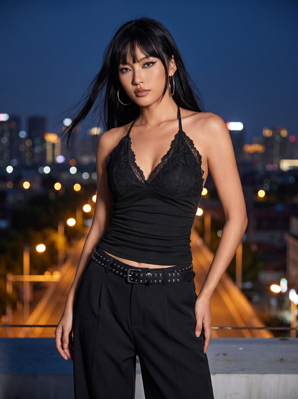Model wearing the Lace-Up Goth Halter Crop Top