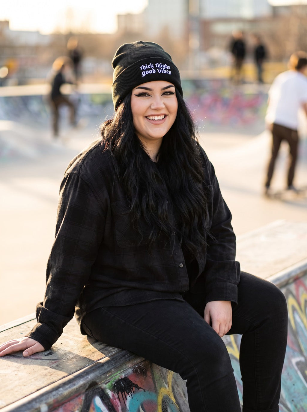Model wearing the Thick Thighs Good Vibes Embroidered Beanie